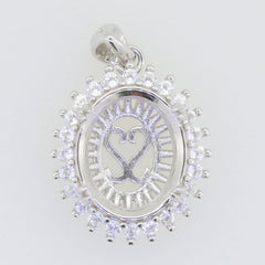 Sterling silver semi mount pendant setting with oval halo and white topaz accent, 12x10mm design for custom gemstones.