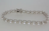 Sterling Silver Semi Mount Tennis Bracelet Setting with oval stone placements for customization.