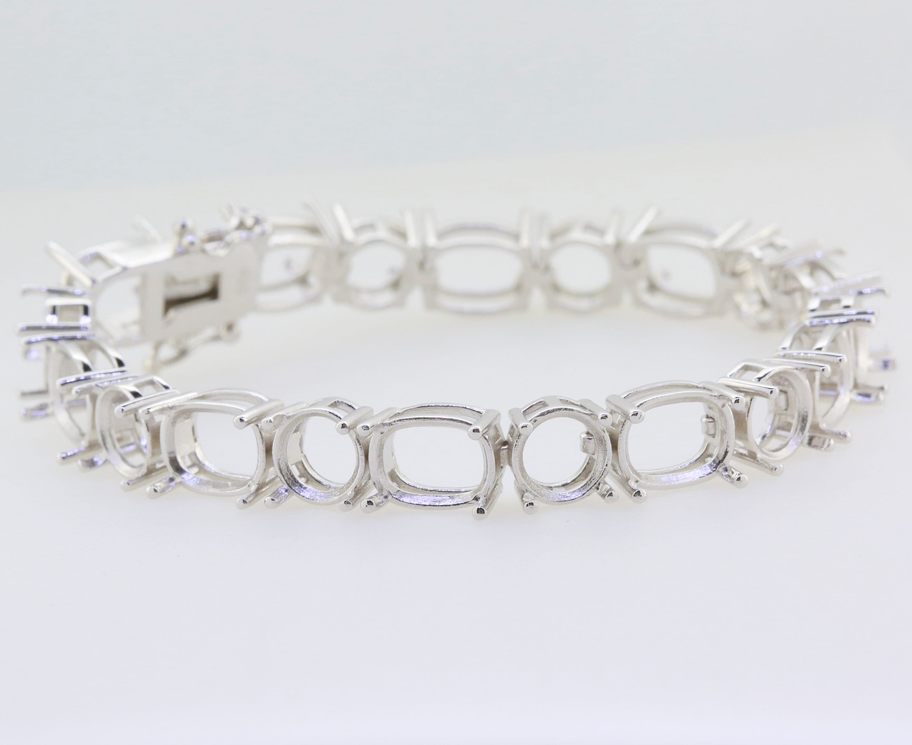 Sterling Silver Semi Mount Tennis Bracelet Setting with cushion and round openings, made to order with stainless steel tongue.