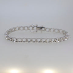Sterling silver semi mount tennis bracelet setting with round 3x3mm gemstone placeholders, elegant design.