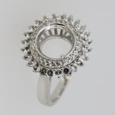 Sterling silver semi mount ring setting with double halo design and white topaz accents, ready for customization.