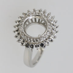 Sterling silver semi mount ring setting with double halo design and white topaz accents, ready for customization.