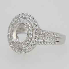 Custom Sterling Silver Semi Mount Ring Setting for 7x5mm stone with White Topaz accent in halo design.