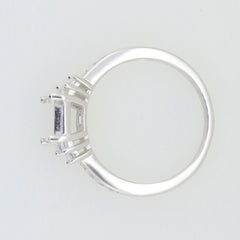 Sterling Silver Semi Mount Ring Setting for 8x6mm Emerald, featuring White Topaz accents in a halo design.
