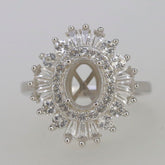 Sterling silver semi mount ring setting with white topaz and oval center for custom gemstone designs.
