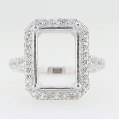 Custom sterling silver semi mount ring setting with halo of white topaz, designed for emerald 12x10mm gemstone.