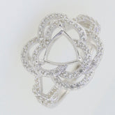 Sterling silver semi mount ring setting with halo design and white topaz accents, featuring a trillion cut center.