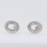 Sterling silver semi mount earrings setting with white topaz, oval 8x6mm, customizable design for personalized options.