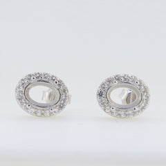 Sterling Silver semi mount earrings setting with oval shape, featuring sparkling white topaz gemstones.
