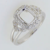 Sterling silver semi mount ring setting with cushion halo and white topaz accent gemstones.