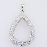 Sterling silver semi mount pendant setting in teardrop shape, adorned with sparkling white topaz gemstones.