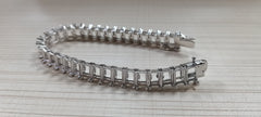 Custom sterling silver semi mount tennis bracelet setting for emerald cut gemstones, made to order, stainless steel tongue.