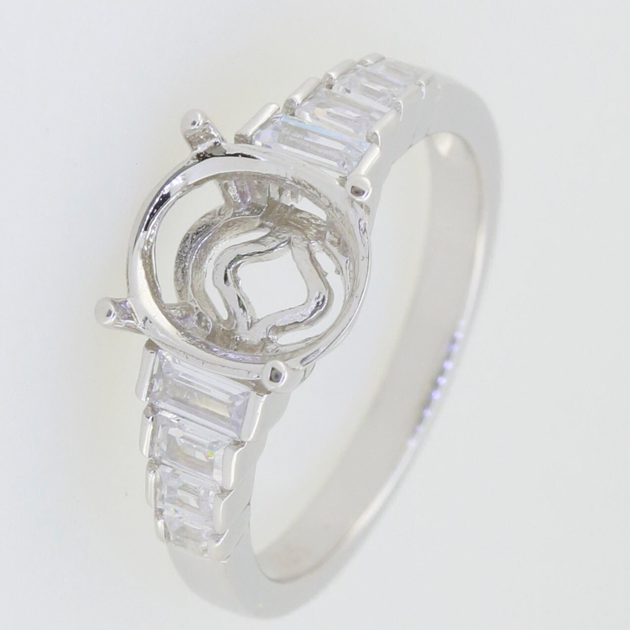 Sterling Silver Semi Mount Ring Setting with Oval 10x8mm space for gemstone, elegant design, customizable.