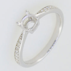 Sterling silver semi mount ring setting with round 5x5mm centerpiece and Moissanite accents, ideal for custom designs.