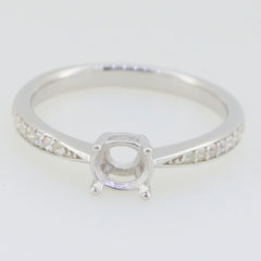 Sterling silver semi mount ring setting with moissanite accents, designed for a 5x5mm round solitaire stone.