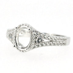 Sterling silver semi mount ring setting with accent stones and oval center for 8x6mm gemstone, ideal for custom jewelry.