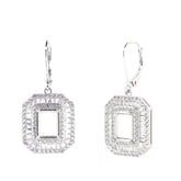 Sterling silver semi mount dangle earrings setting with baguette and halo design, ready for emerald 9x7mm stones.