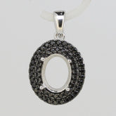 Sterling silver semi mount pendant setting with black spinel stones, designed for an oval gemstone 9x7mm.