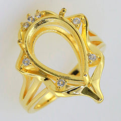 Gold Semi Mount Ring Setting with Pear Shape and White Topaz Accents, perfect for custom gemstone placement.