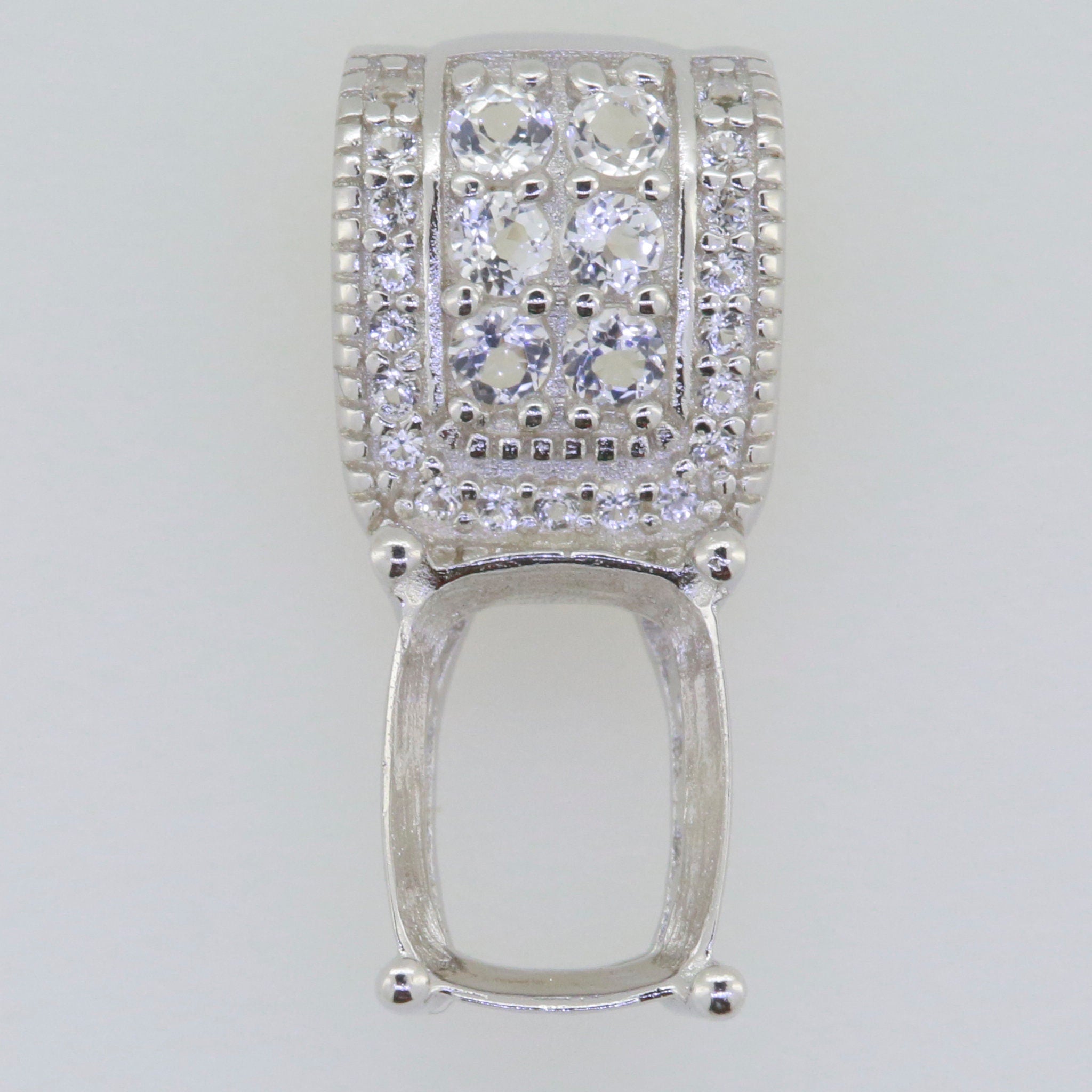 Sterling Silver Semi Mount Pendant Setting with White Topaz, 9x7mm size for custom gemstone placement.