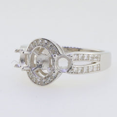 Sterling silver semi mount ring setting with three stones and a round 7x7mm pearl space for customization.