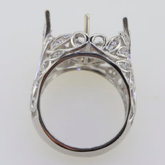 Sterling silver semi mount ring setting with intricate Art Nouveau design for 12mm pearl, featuring white topaz accents.