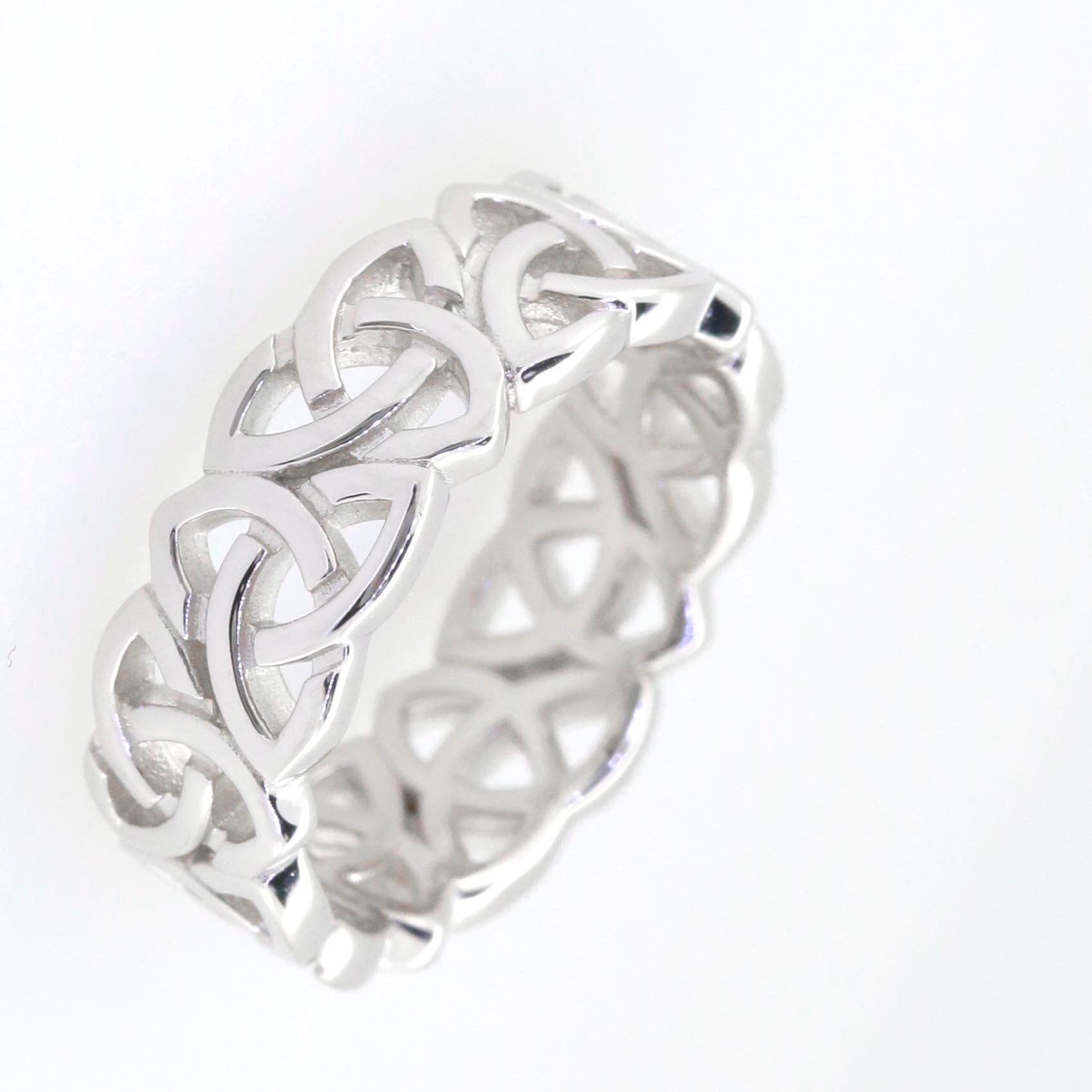 Sterling Silver Infinity Celtic Knot Band Engagement Wedding Ring, handcrafted and available in various sizes.