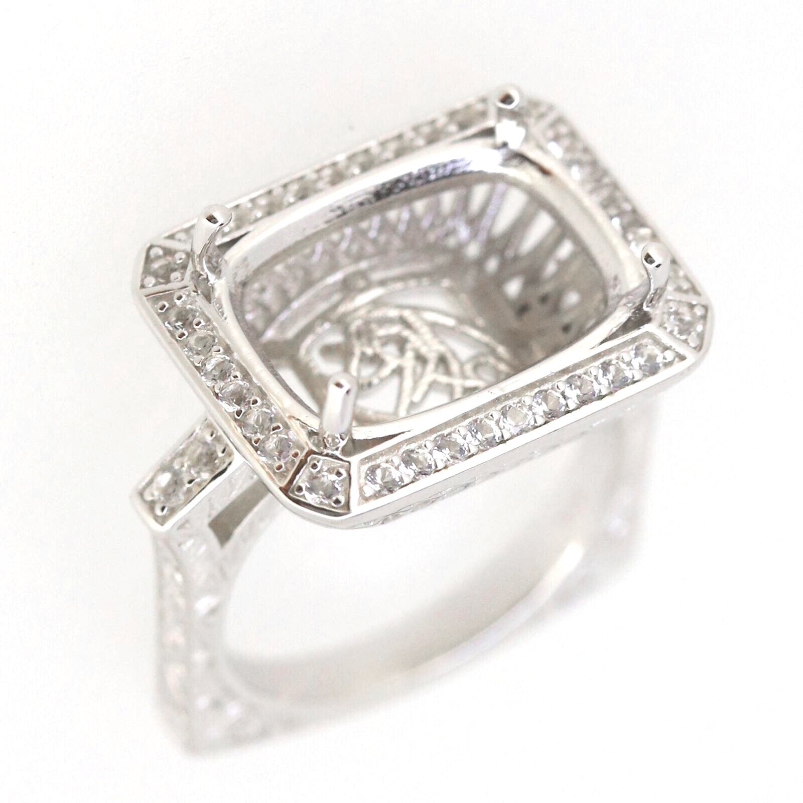 Sterling silver semi mount ring setting with cushion design, featuring white topaz accents and an old Euro shank.