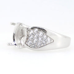 Sterling silver semi mount ring setting with white topaz, designed for 10x8mm oval gemstones, elegant style.