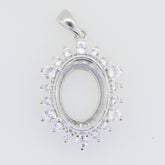 Sterling silver semi mount pendant setting with white topaz halo, oval design for customizable gemstone options.