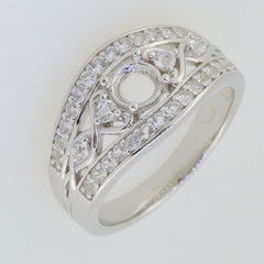 Sterling silver semi mount ring setting featuring round moissanite stones, elegantly designed for engagement.