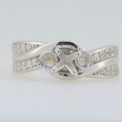 Sterling silver semi mount ring setting with white topaz accent and unique twisted design for 3 stones.