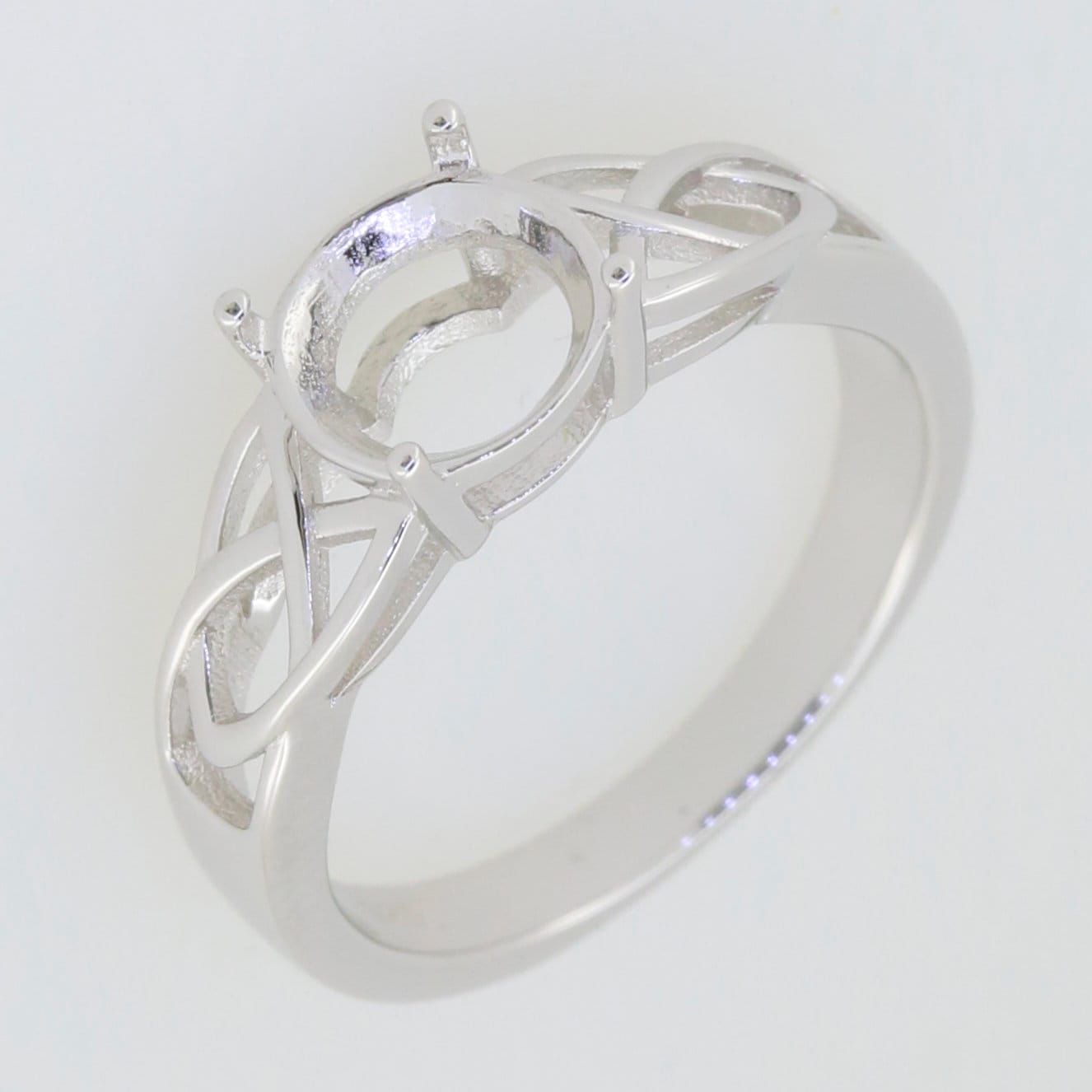 Sterling silver semi mount ring setting with infinity Celtic knot design, sized to order, elegant jewelry piece.