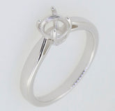 Sterling silver semi mount ring setting with round 6.5x6.5mm solitaire, perfect for custom jewelry designs.