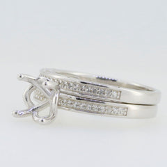 Sterling silver semi mount ring setting with round moissanite stones, featuring a unique design for customizable engagement options.