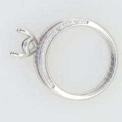 Sterling silver semi mount ring setting with round stone holder and elegant pave design for engagement rings.
