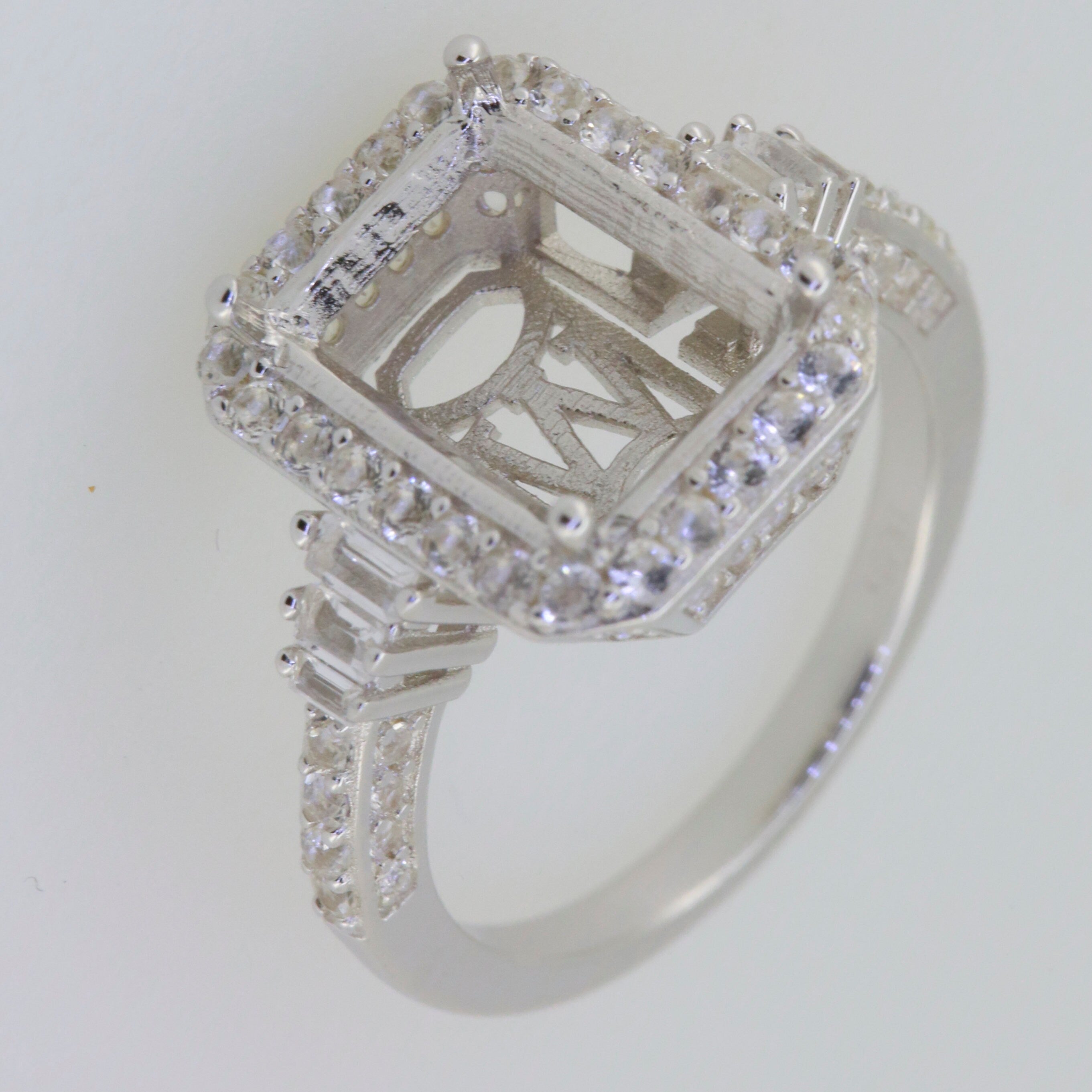 Sterling Silver Semi Mount Ring Setting with White Topaz, featuring an elegant halo design, ideal for custom gemstones.