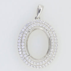 Sterling silver semi mount oval pendant setting with double halo of white topaz, made to order for custom gemstones.
