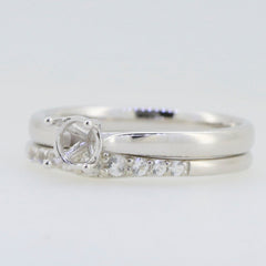 Sterling silver semi mount ring setting with round 5x5mm stone holder and decorative band for engagement.