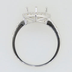 Sterling silver semi mount ring setting with halo design for 8x8mm gemstone, featuring white topaz accents.