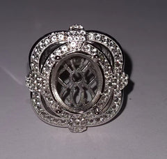 Sterling silver semi mount ring setting with oval gemstone, adorned with sparkling accents, make to order jewelry.