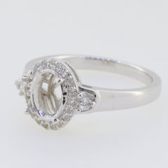 Sterling silver semi-mount ring setting for 8x6mm oval gemstone with D color Moissanite accent stones.