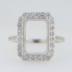 Sterling Silver semi mount ring setting with halo of D Color moissanite accents, designed for custom gemstone sizing.
