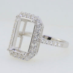 Sterling Silver semi mount ring setting with halo, designed for 12x10mm center stone, featuring D Color Moissanite accents.
