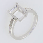 Custom sterling silver semi-mount ring setting with moissanite accents and empty center for personalization.