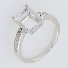 Custom sterling silver semi-mount ring setting with moissanite accents and empty center for personalization.