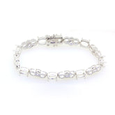 Sterling silver semi mount tennis bracelet setting with oval white topaz accents and stainless steel tongue.