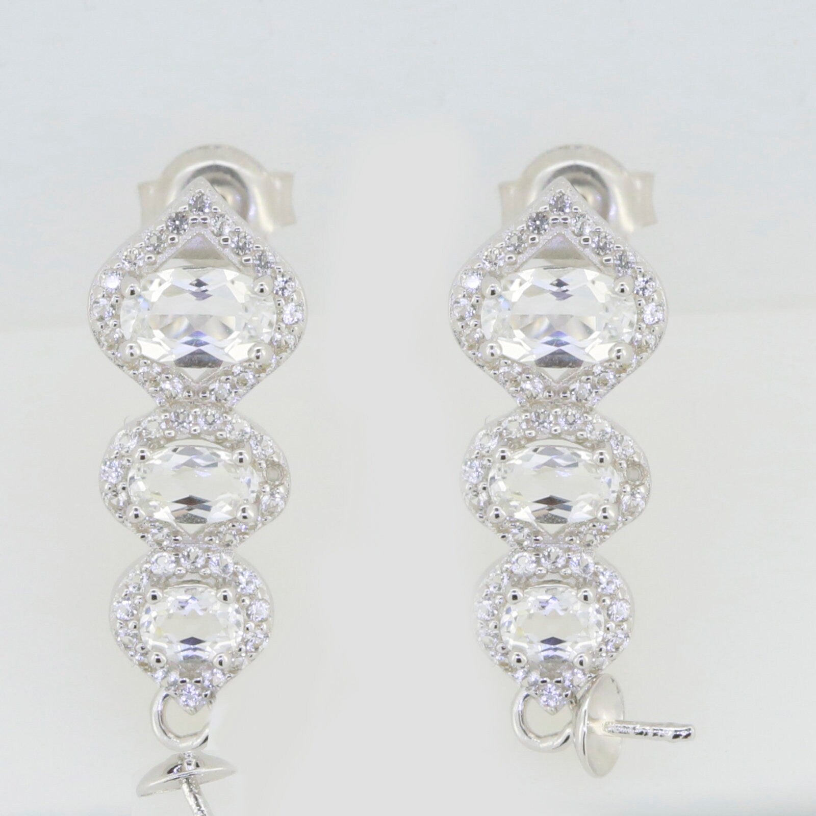 Sterling Silver Semi Mount Earrings Setting with White Topaz, featuring round gems in a stylish design perfect for customization.