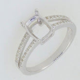 Sterling silver semi mount ring setting with cushion slot for 9x7mm white topaz and split shank design.