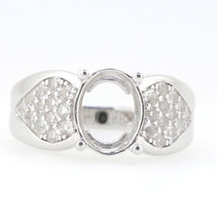Sterling silver semi mount ring setting with oval 10x8mm center and white topaz gemstones on the sides.